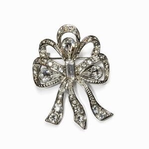 Signed Monet Crystal Bow BroochSilver Tone Vintage DesignerDescriptio